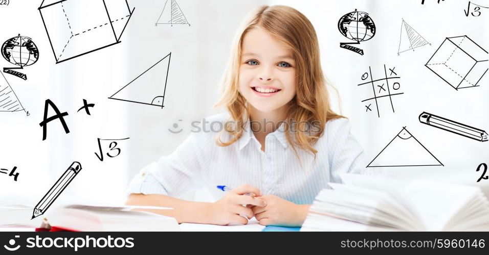 education and school concept - little student girl studying at school. student girl studying at school