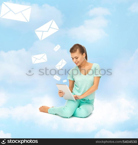 education and technology concept - young woman sitting on the cloud with tablet pc