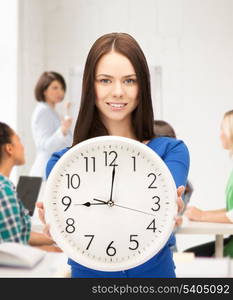 education and time management concept - attractive student showing clock