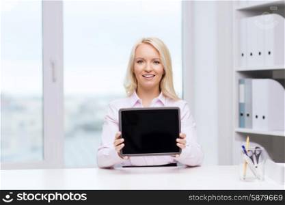 education, business and technology concept - smiling businesswoman or student showing tablet pc computer blank screen in office