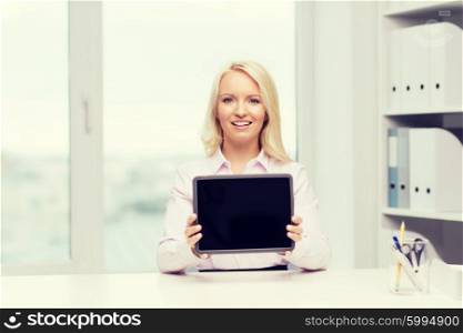education, business and technology concept - smiling businesswoman or student showing tablet pc computer blank screen in office