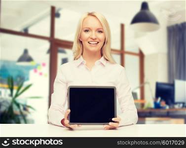 education, business and technology concept - smiling businesswoman or student showing tablet pc computer blank screen over office room background