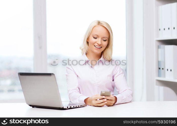 education, business, communication and technology concept - smiling businesswoman or student with smartphone texting message in office