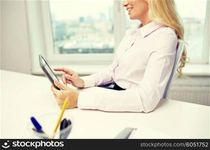 education, business, people and technology concept - close up of smiling businesswoman or student with tablet pc computer in office