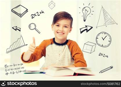education, childhood, people and school concept - happy student boy with textbook and notebook showing thumbs up at home over mathematical doodles. happy student boy with textbook showing thumbs up
