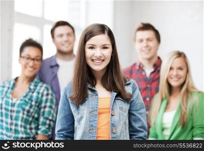 education concept - group of students at school