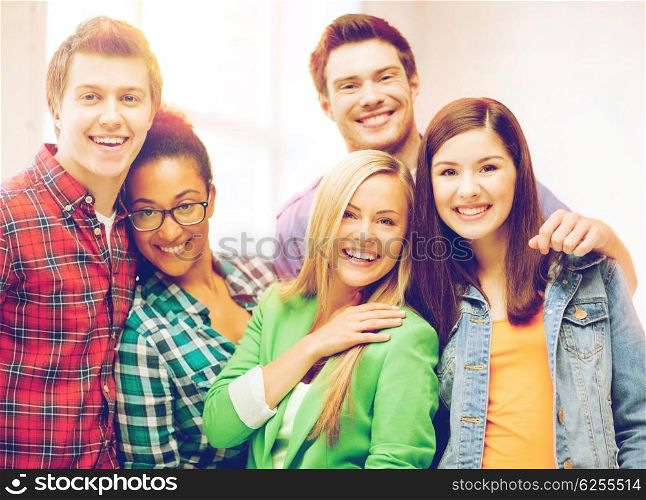 education concept - group of students at school. group of students at school