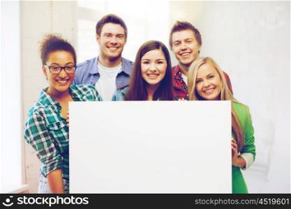 education concept - group of students at school with blank white board. group of students at school with blank board