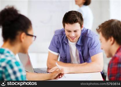education concept - group of students studying at school