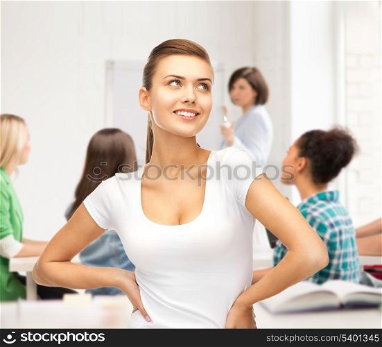 education concept - smiling student girl in blank white t-shirt at school