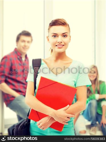 education concept - smiling student girl with folders and school bag