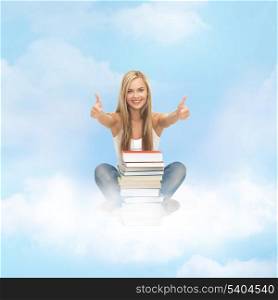 education concept - smiling student with stack of books sitting on the cloud