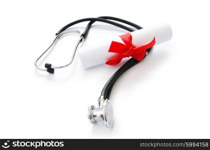 Education concept with diploma and stethoscope on white