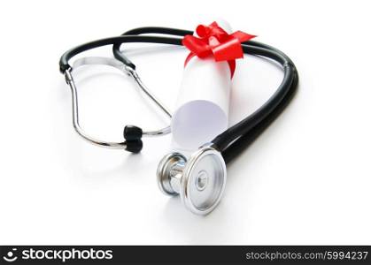 Education concept with diploma and stethoscope on white