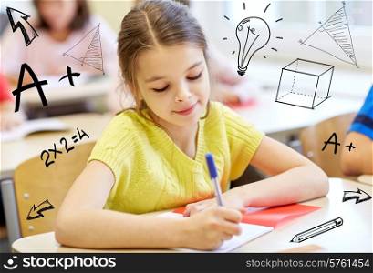 education, elementary school, learning and people concept - group of school kids with notebooks writing test in classroom over doodles