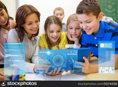 education, elementary school, learning, technology and people concept - group of kids with teacher looking to tablet pc computer in classroom over virtual screens projections. group of kids with teacher and tablet pc at school