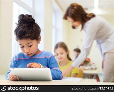 education, elementary school, technology and children concept - little student girl with tablet pc over classroom and teacher background