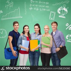 education, friendship and people concept - group of smiling students with folders and bags over green board