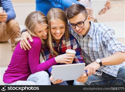 education, friendship, technology, drinks and people concept - group of smiling students with tablet pc computer and paper coffee cup taking selfie or video