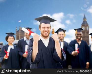 education, gesture and people concept - group of happy international students in mortar boards and bachelor gowns with diplomas celebrating successful graduation over london city background