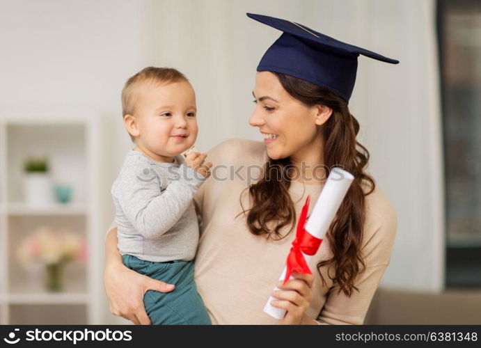 education, graduation and motherhood concept - happy mother student with baby boy and diploma at home. mother student with baby boy and diploma at home