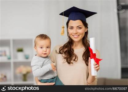 education, graduation and motherhood concept - happy mother student with baby boy and diploma at home. mother student with baby boy and diploma at home. mother student with baby boy and diploma at home