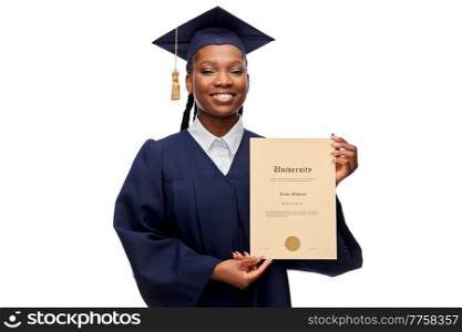 education, graduation and people concept - happy graduate student woman in mortarboard and bachelor gown showing diploma of university over white background. happy female graduate student with diploma