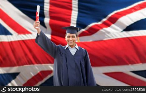education, graduation and people concept - happy male student in mortarboard and bachelor gown with diploma over british flag background