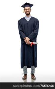education, graduation and people concept - happy smiling male graduate student in mortar board and bachelor gown with diploma over grey background. male graduate student in mortar board with diploma