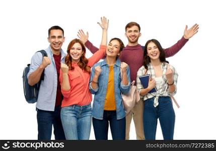 education, high school and people concept - group of happy students celebrating success over white background. group of happy students celebrating success