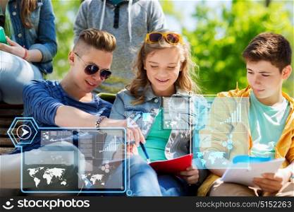 education, high school and people concept - group of happy teenage students with notebooks learning outdoors over virtual screens. group of students with notebooks at school yard