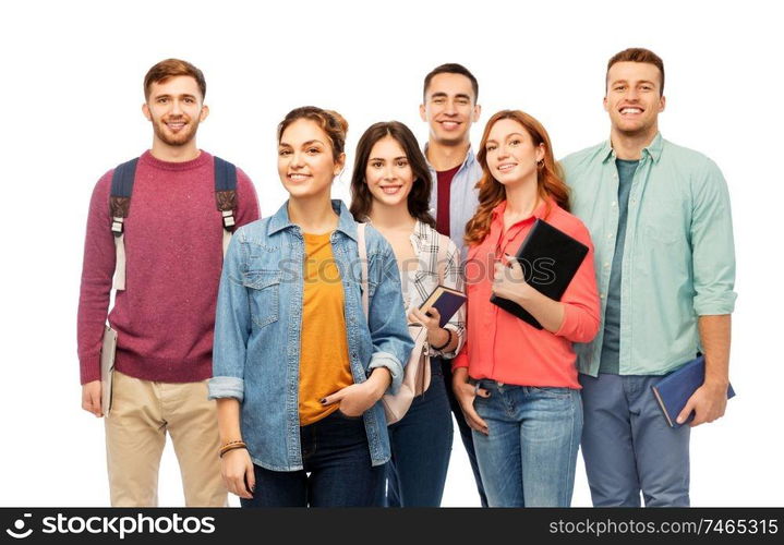 education, high school and people concept - group of smiling students with books over white background. group of smiling students with books