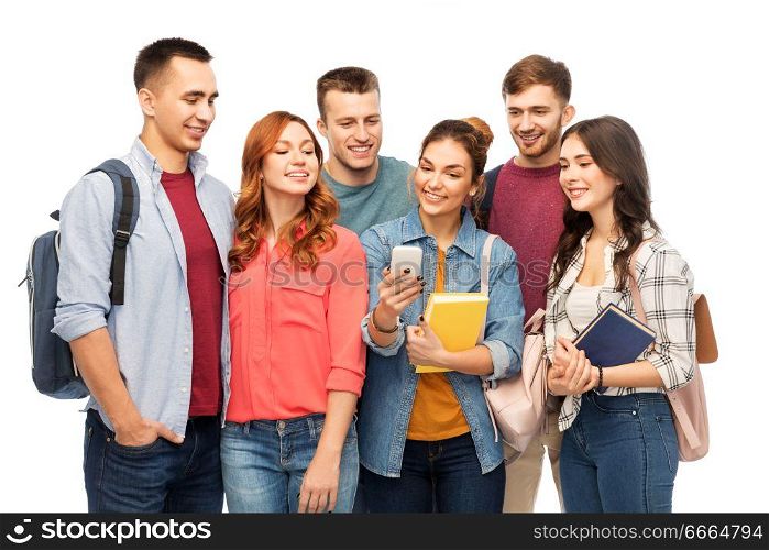 education, high school and technology concept - group of smiling students with books and smartphone over white background. group of smiling students with smartphone