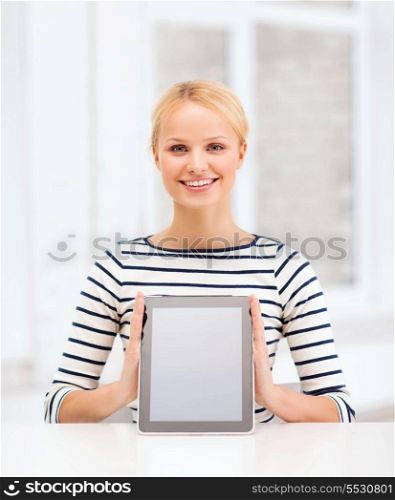 education, internet and technology concept - smiling teenage girl with blank tablet pc screen at home or school