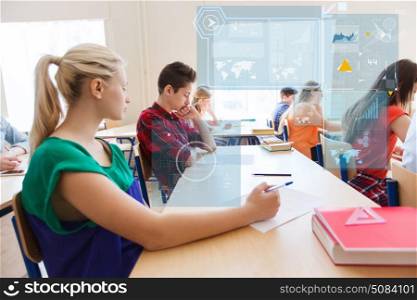 education, learning, statistics and people concept - group of students writing school test over virtual screens with charts. group of students writing school test. group of students writing school test