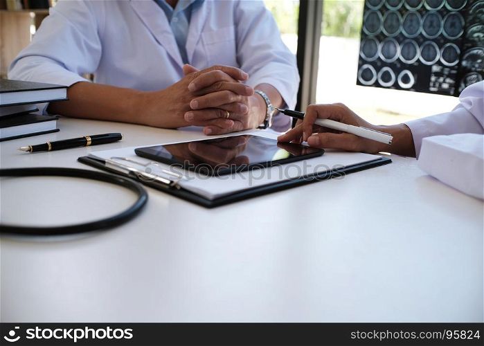 Education profession people and medicine concept close up of happy doctors with tablet and papers at seminar or hospital
