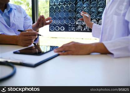 Education profession people and medicine concept close up of happy doctors with tablet and papers at seminar or hospital