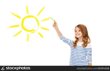 education, school and happy people concept - cute little girl drawing big sun in the air