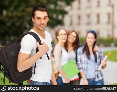 education, school and vacation concept - travelling student with backpack