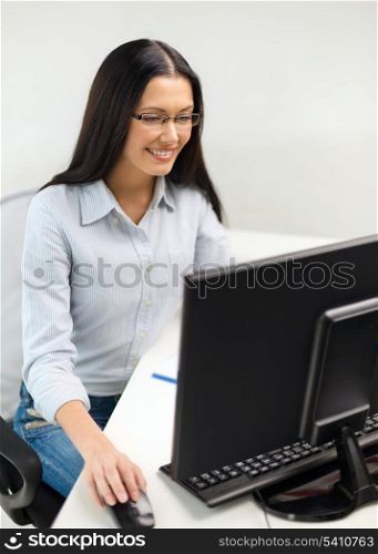 education, school, business and technology concept - smiling businesswoman or student wearing black eyeglasses