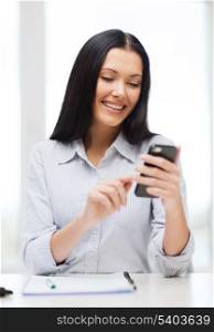 education, school, business, communication and technology concept - smiling businesswoman or student with smartphone texting