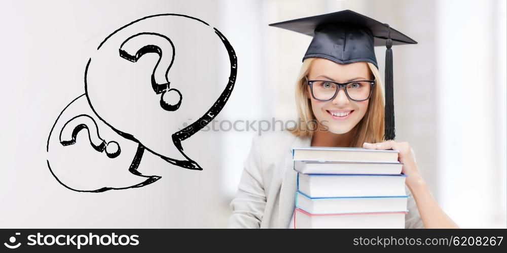 education, school, graduation and people concept - happy student girl or woman in graduation cap with stack of books over question marks