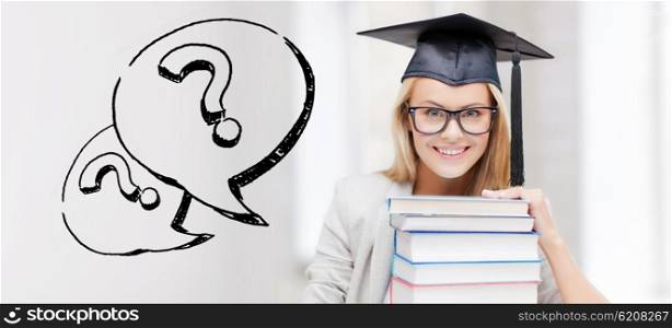 education, school, graduation and people concept - happy student girl or woman in graduation cap with stack of books over question marks
