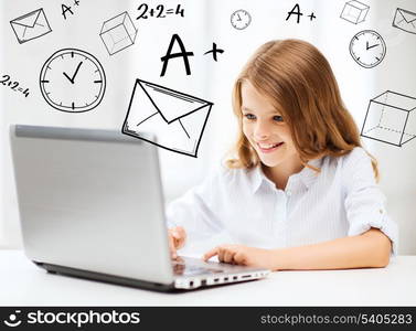 education, school, technology and internet concept - little student girl with laptop pc at school