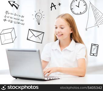 education, school, technology and internet concept - little student girl with laptop pc at school