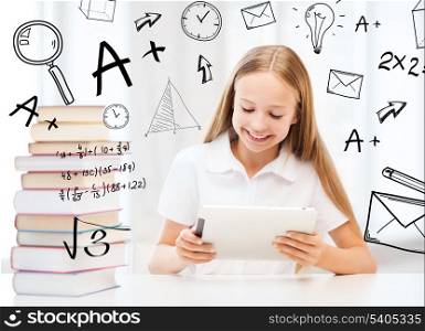 education, school, technology and internet concept - little student girl with tablet pc and books at school