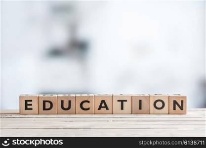 Education sign on a wooden table in a room