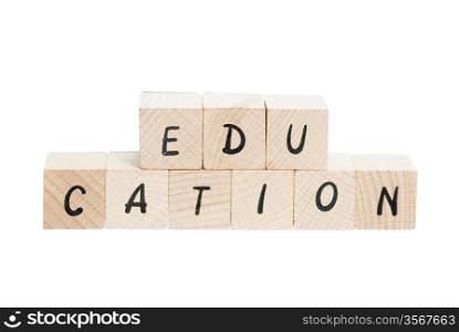 Education spelled out with wooden blocks. White background.