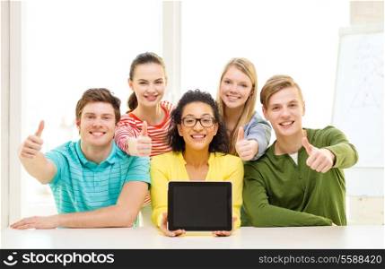 education, technology and college concept - five smiling students with tablet pc computer blank screen at school showing thumbs up