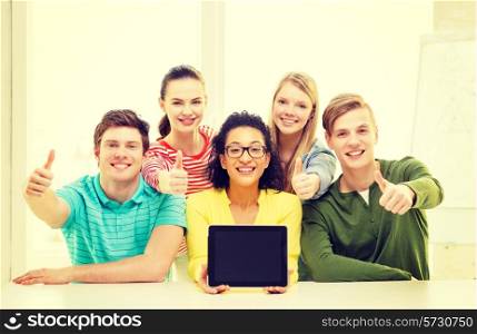 education, technology and college concept - five smiling students with tablet pc computer blank screen at school showing thumbs up